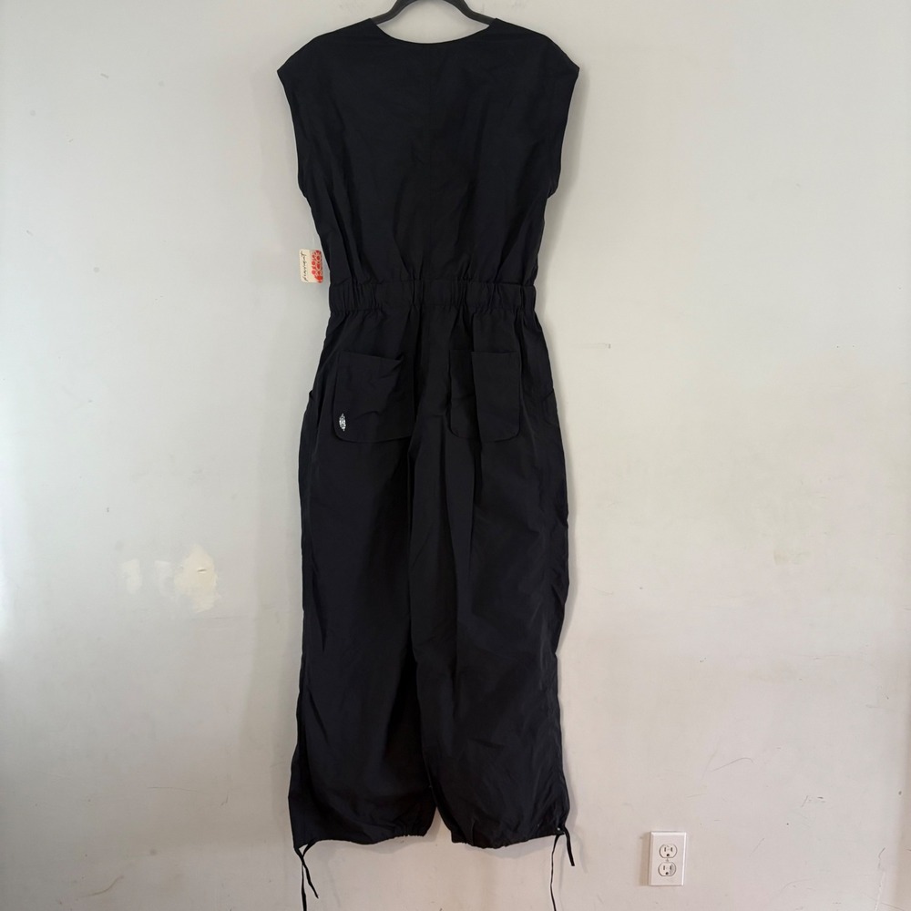Free People FP Movement Fly By‎ Night Jumpsuit Sz S Wide Leg Black Pocket NEW - Picture 7 of 14